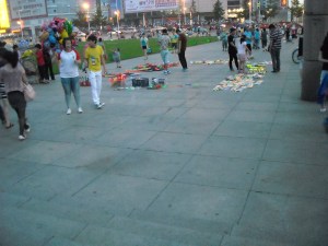 Yep...there it goes...slipping and sliding right into those kites and toys he's trying to sell...