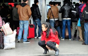 Yup...It was either this or lose her spot looking for the bathroom.  Credit: baidu